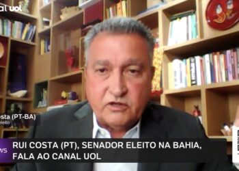 Flávio Bolsonaro vai a debate com Lula porque está caindo nas pesquisas, afirma Rui Costa